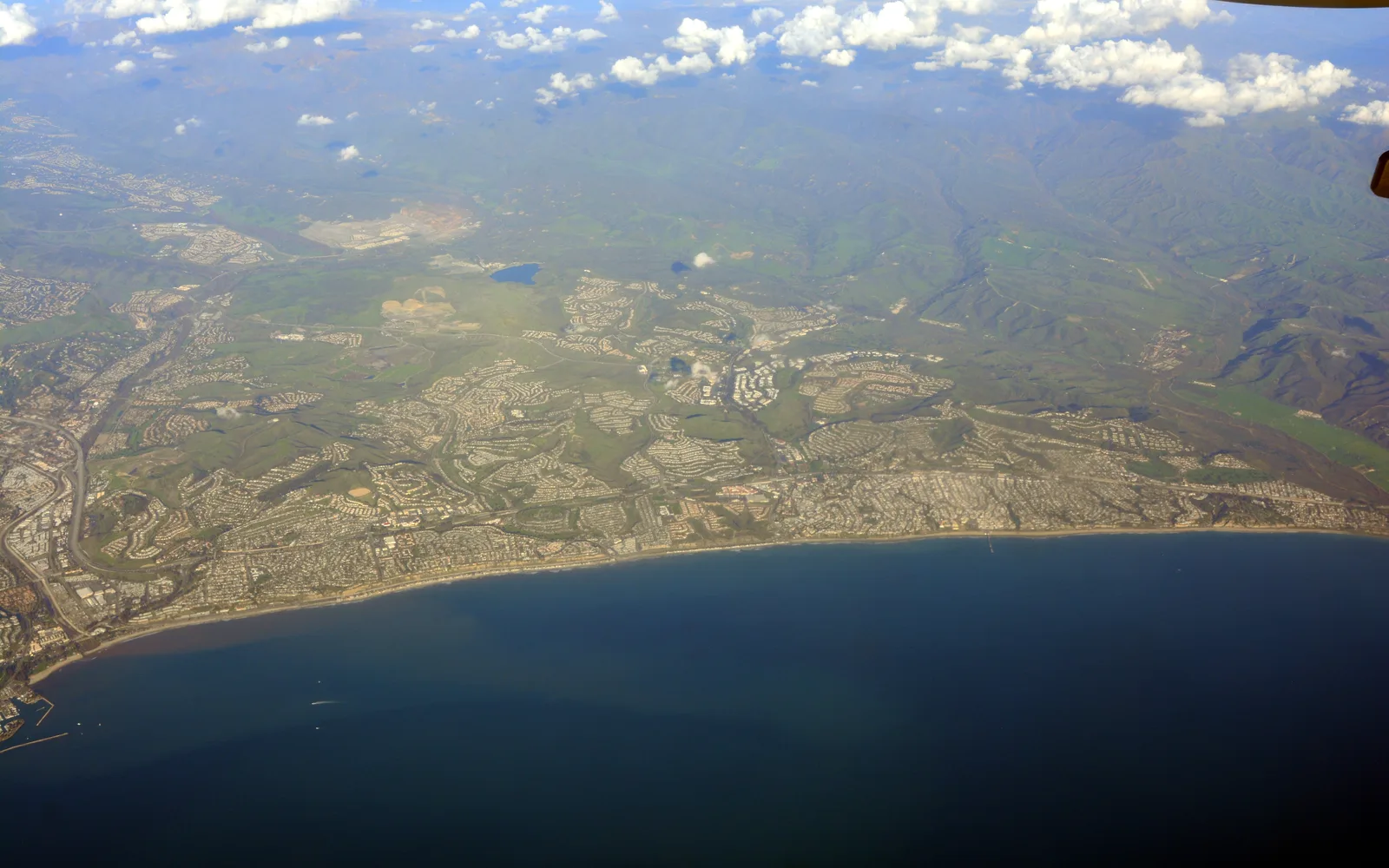 Aerial view of the San Clemente California coast looking northeast with the city and Pacific Ocean visible